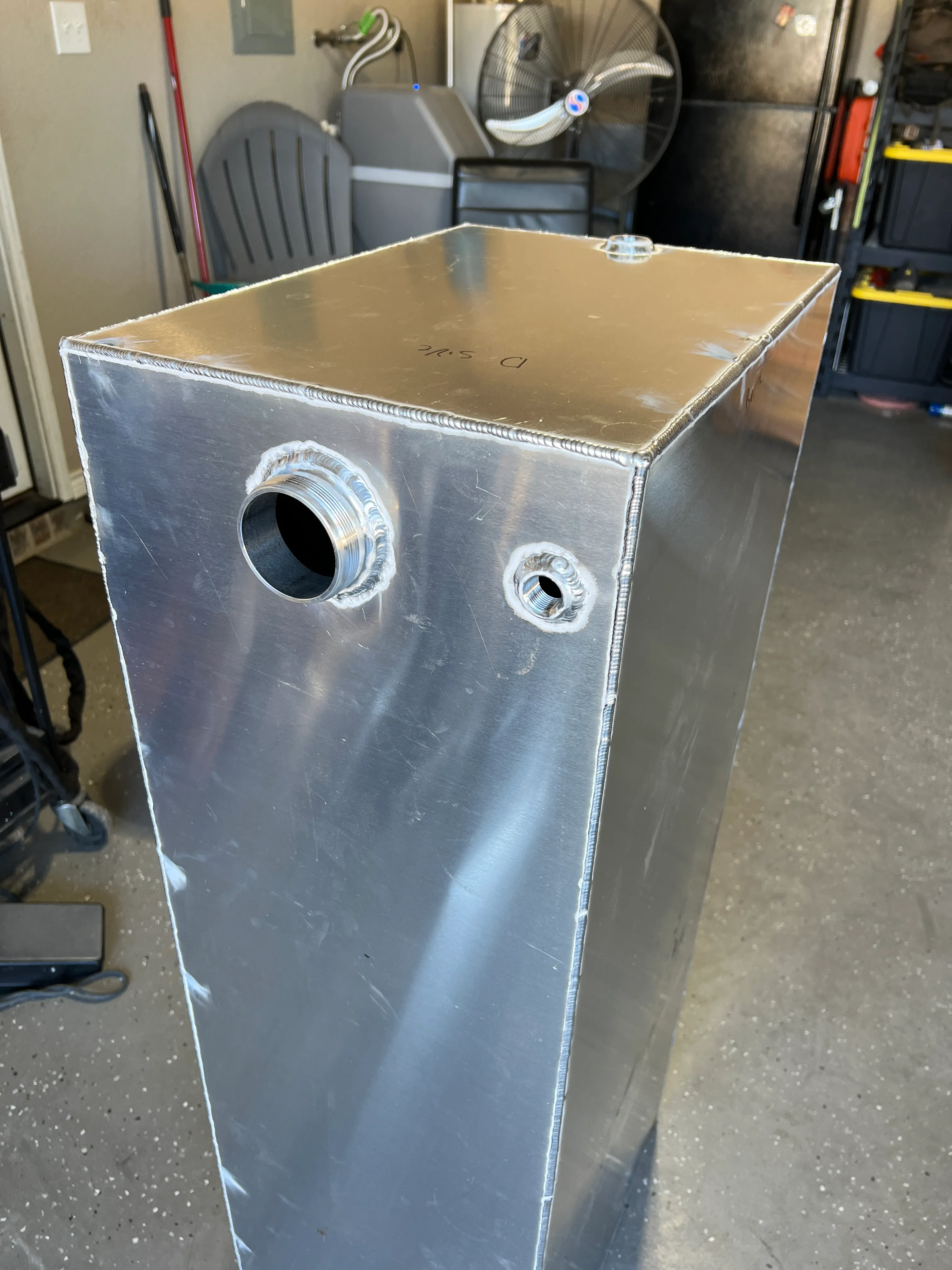 Fabricated aluminum tank with precision fittings