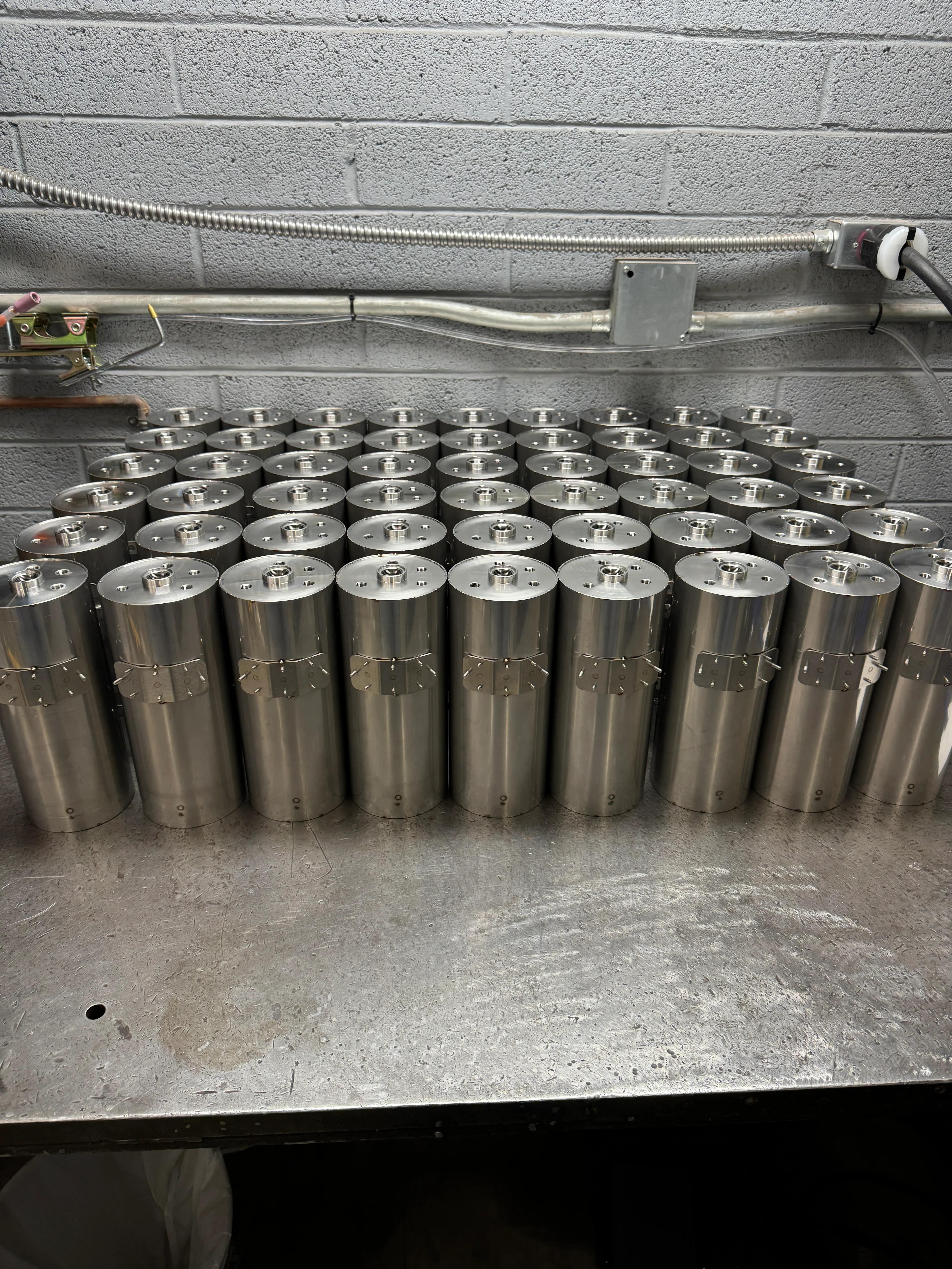 Array of precision-machined metal cylinders