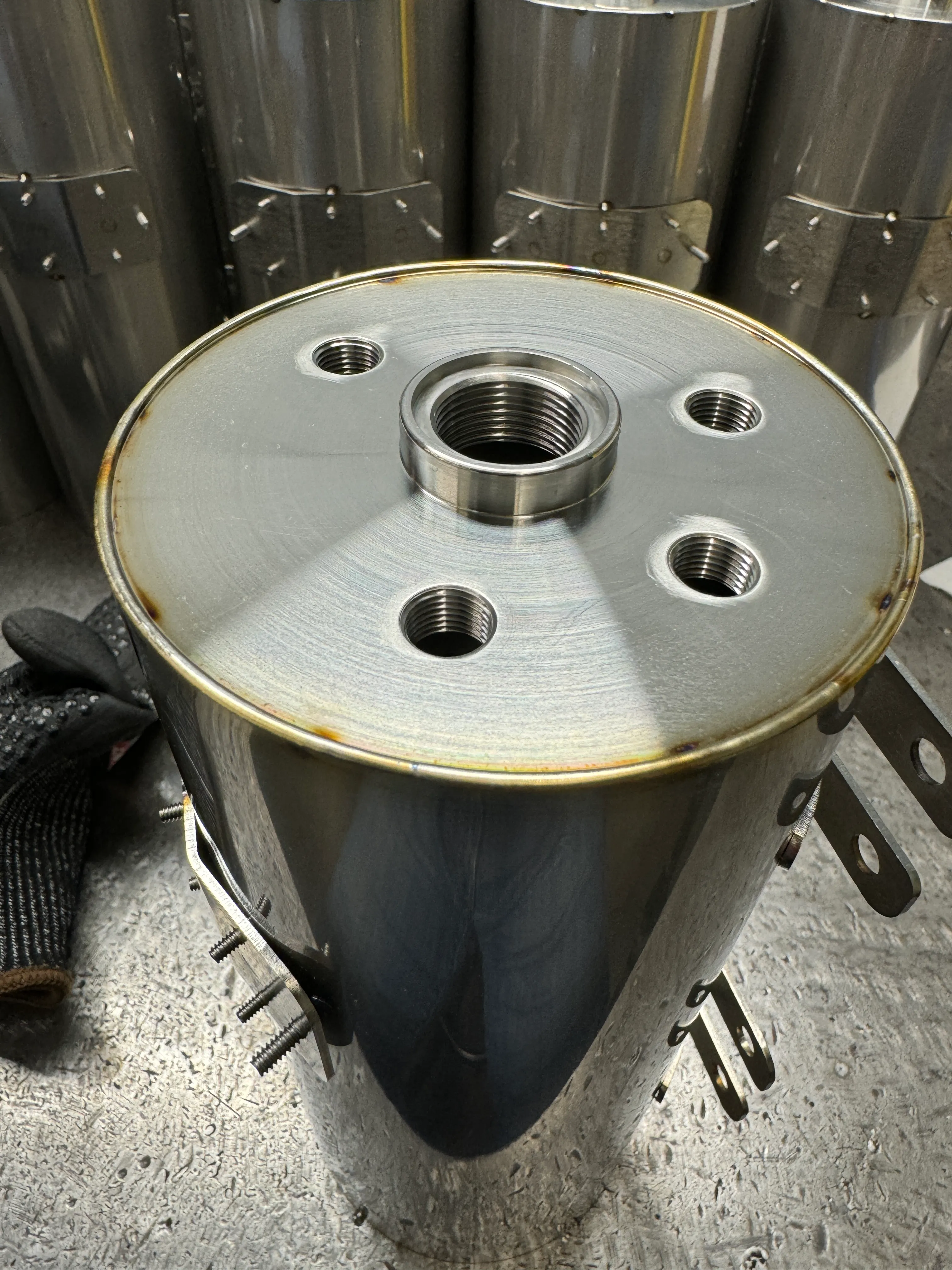 Machined cylindrical assembly with threaded center